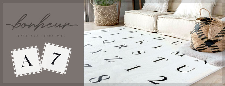 アルファベットデザイン。プレイマット。ボヌール
