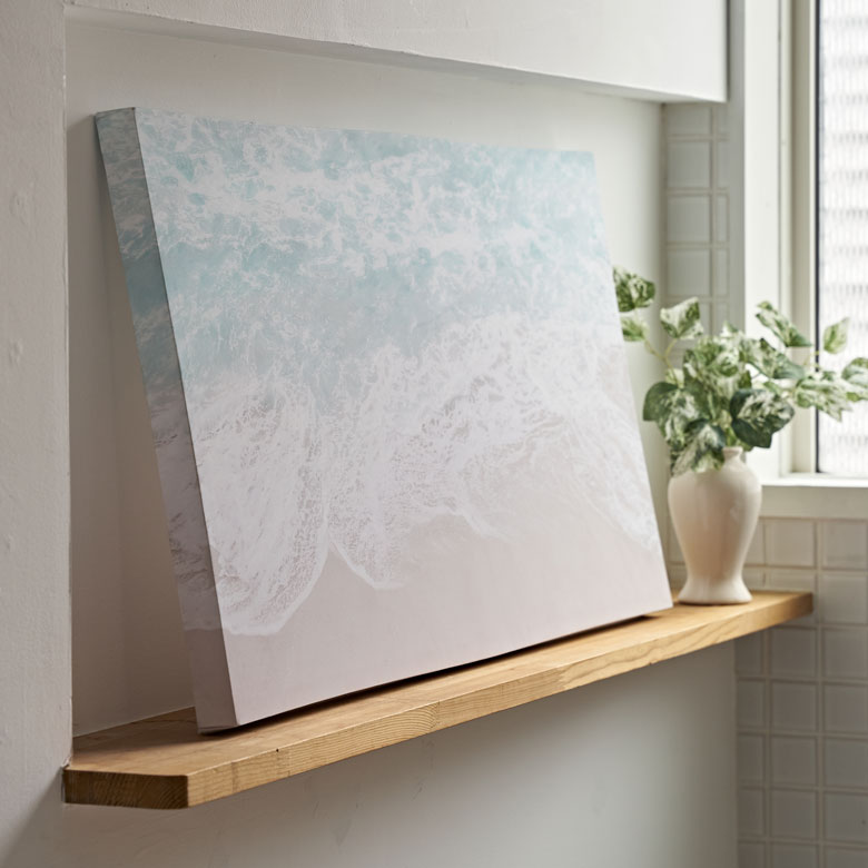 淡いブルーを基調にした現代アートのようなキャンバスアート
