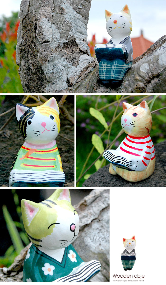 木彫りならではの素朴で温かみが伝わるネコのオブジェ。
