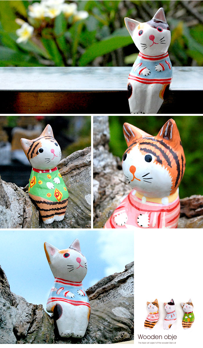 木彫りならではの素朴で温かみが伝わるネコのオブジェ。