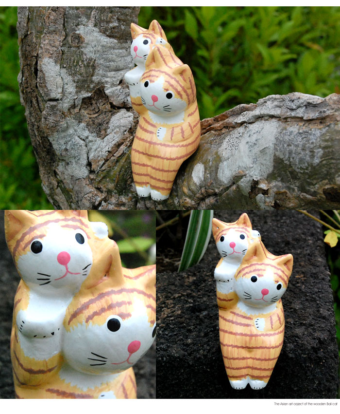 木彫りならではの素朴で温かみが伝わるネコのオブジェ。