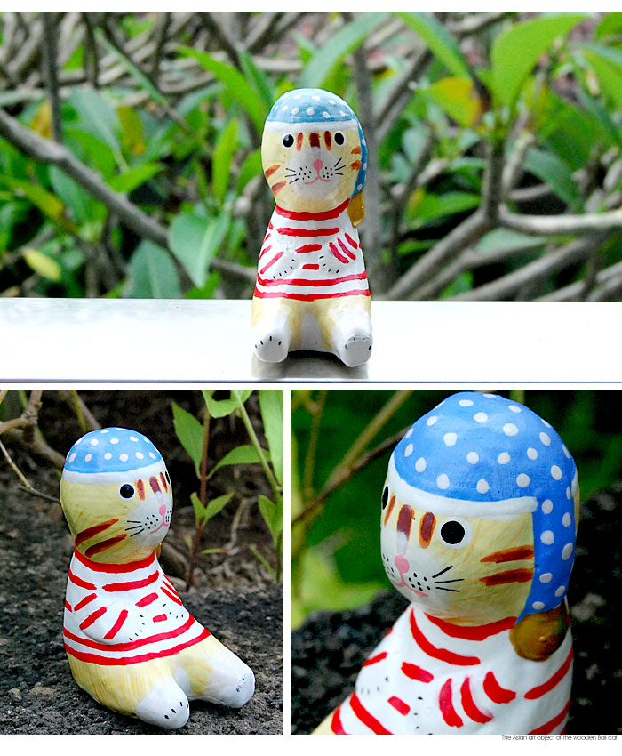 木彫りならではの素朴で温かみが伝わるネコのオブジェ。